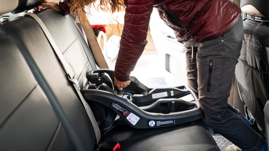 graco snugride 35 lite lx - we had to get into the vehicle to apply pressure to the lite lx to...