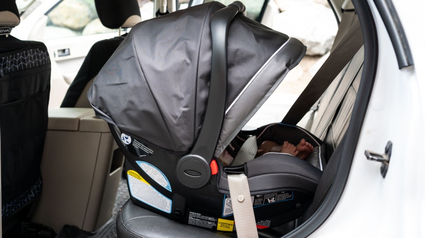 graco snugride snuglock 35 - the side slots on the snuglock for the vehicle belt require a little...