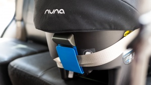 The shoulder portion of the vehicle belt tucks into a clip on the...