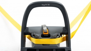 Both the shoulder and lap portions of the vehicle belt go through...
