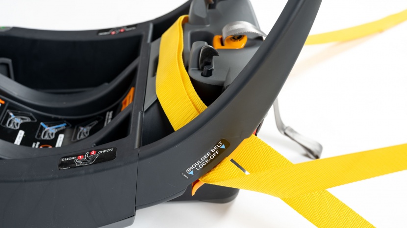 the shoulder portion of the vehicle belt slips into the belt...