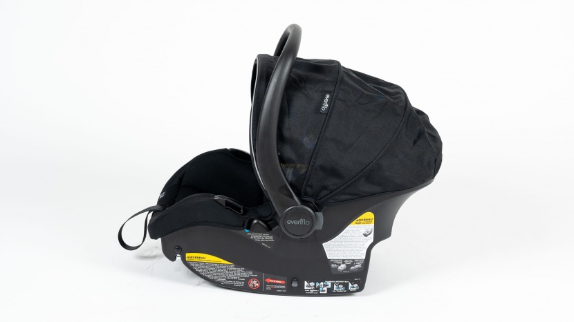 evenflo litemax dlx - the evenflo carrier has a small push-in button on the sides that...