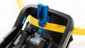 The shoulder and lap portion of the vehicle belt both tuck into the...