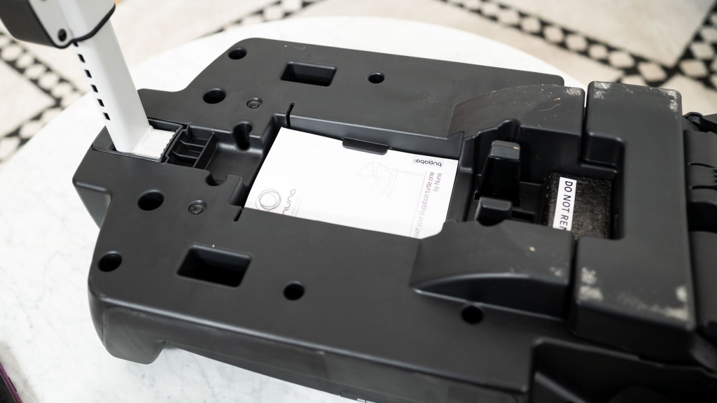 bugaboo turtle one by nuna - the turtle storage manual tucks under two clips under the load leg.