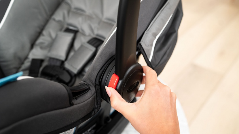 graco snugride snuglock 35 - the handle on the snuglock moves well, but it has a strong conflict...