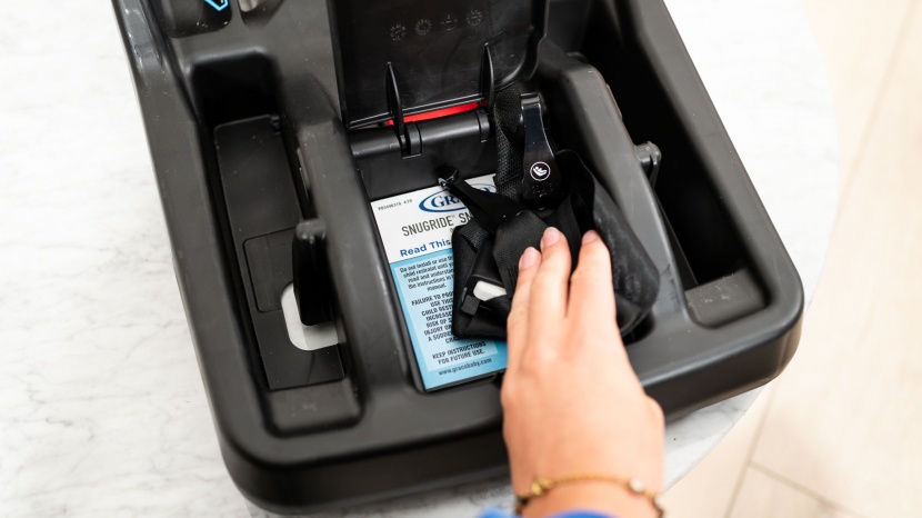 the snuglock storage compartment holds the latch connectors and...