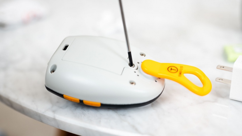 on the timeflys, the belt clip moves out of the way to access the...