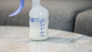 The Lansinoh collection bottle is plastic and has a capacity of 5...