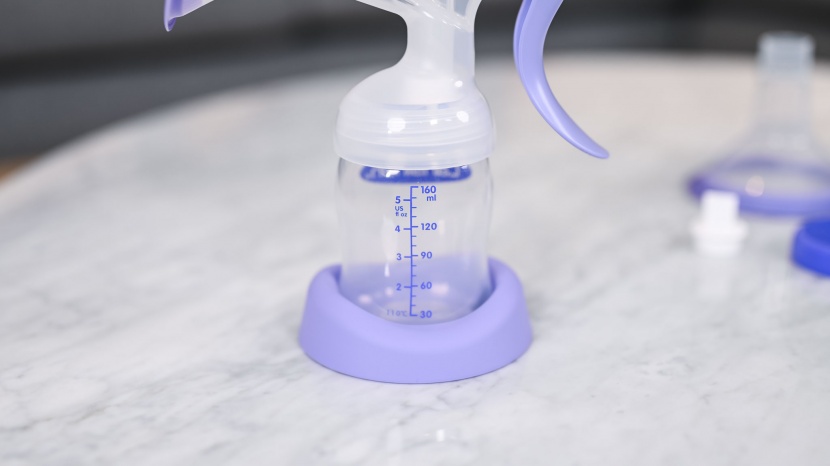 the lansinoh comes with a bottle holder or stand. it is a stable and...