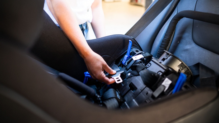 the foonf vehicle belt pathway is under the seat bottom.