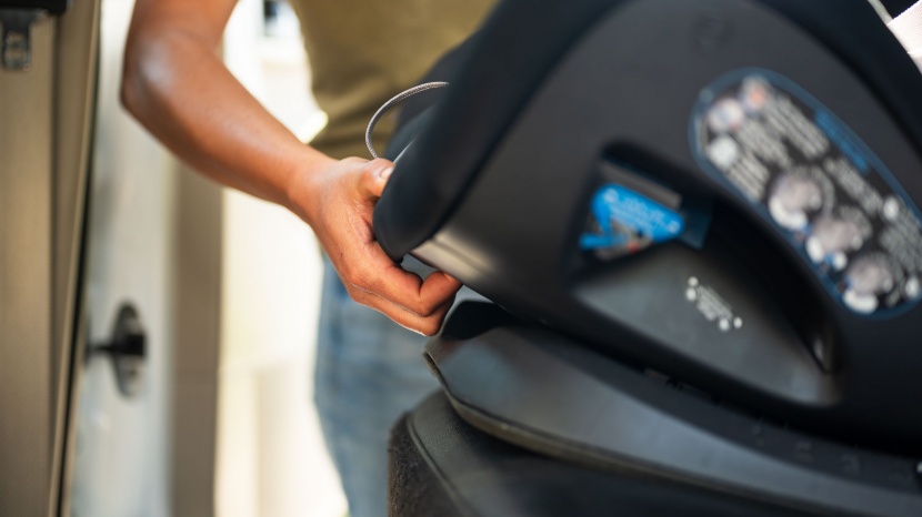 the angle recline adjustment is on the foot of the seat, and while...