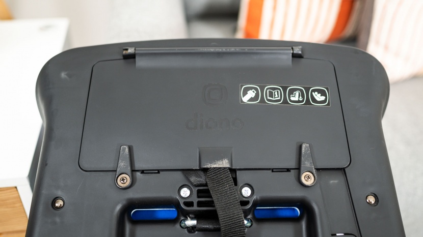 the storage compartment on the bottom of the diono houses the latch...