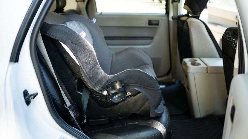 evenflo tribute 5 - forward-facing installation requires adjusting the cover to gain...