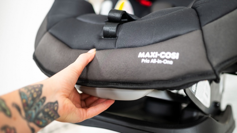 the recline adjustment is on the foot of the seat, and while easy...
