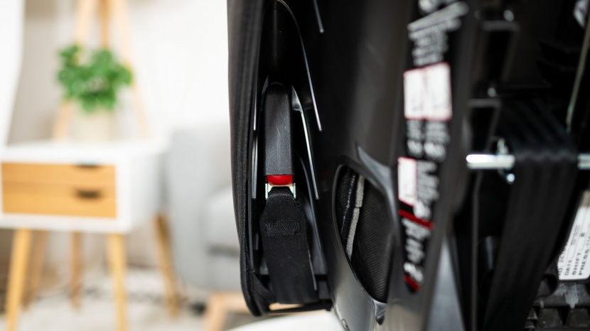 the latch connectors clip on the underside of the seat wings to keep...