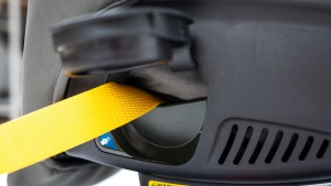 The belt path on the Rava uses the same opening as the cup holder...