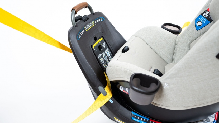 the strap goes under the side retainer on the revv and through the...