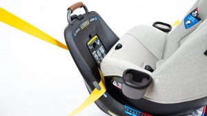 The strap goes under the side retainer on the Revv and through the...