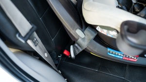 The LATCH strap on the Revv comes from the base of the Revv and...