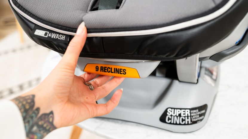 the chicco recline adjustment is on the foot of the chair, so it...