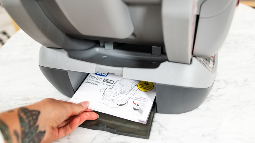 chicco nextfit zip - the manual for the nextfit tucks under the seat chair in the main...