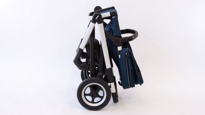 thule sleek double - the sleek has a somewhat larger fold with the seat and back wheels...