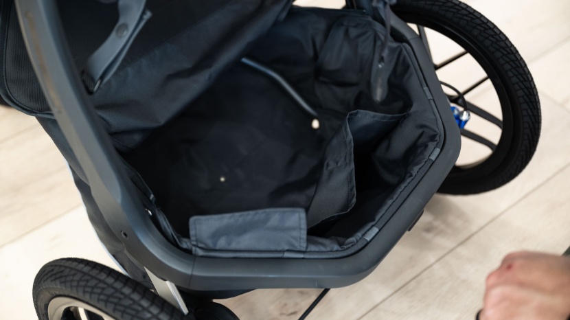 the ridge storage bin has a cover that is partially zipper and the...