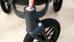 The wheel locking mechanism is color-coded, so you can tell from a...