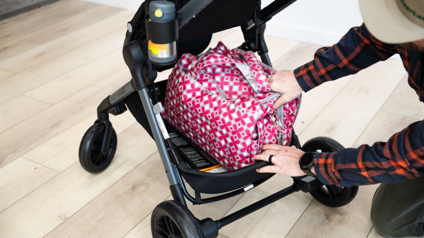 we fit our large diaper bag into the xpand, but the limit of 10 lbs...