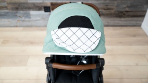 The Mockingbird canopy has a flap cover to look through the...