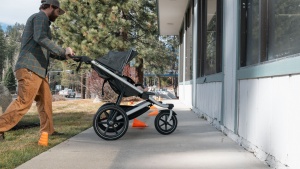 The 3 wheel design of the Urban Glide 2 incorporates larger rubber...