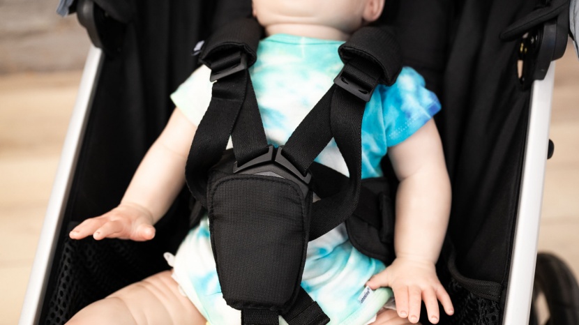 full size stroller - the urban glide 2 has ample padding around the crotch and shoulder...