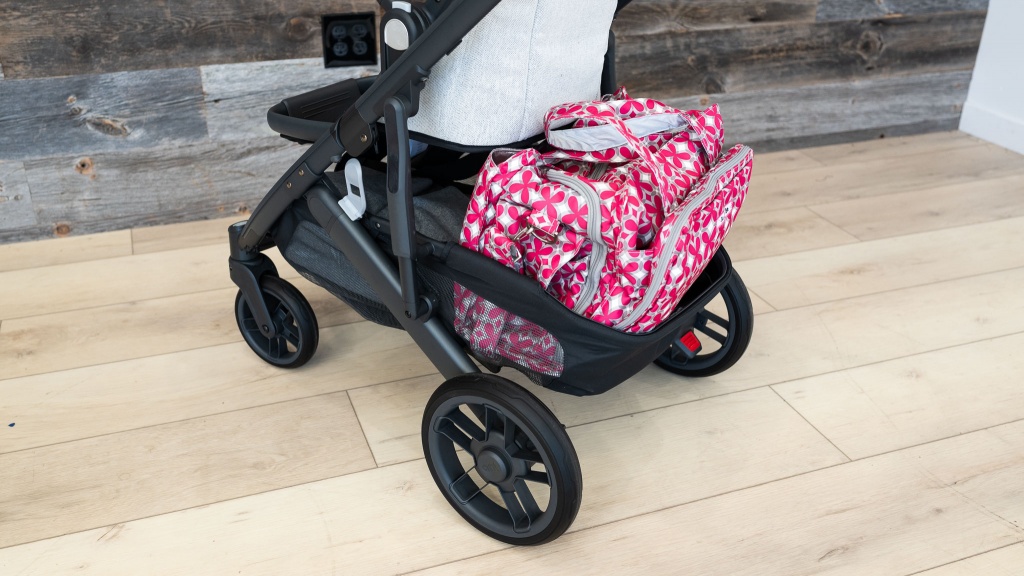 full size stroller - the uppababy cruz v2 storage bin fits our extra large diaper bag and...
