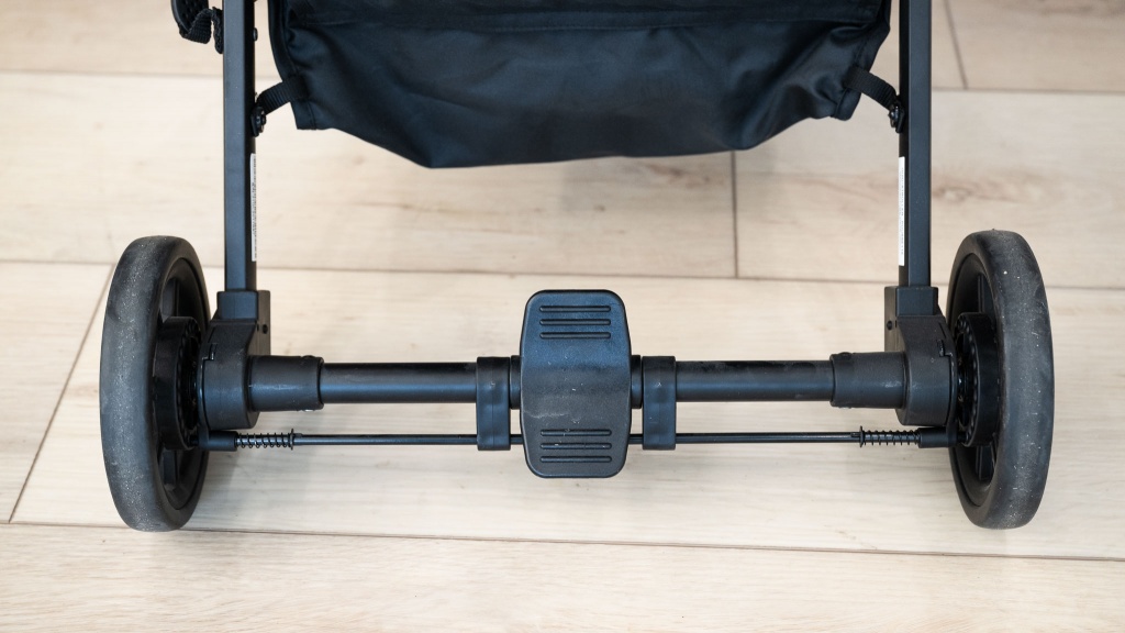 inglesina quid - the quid has a rocker panel brake pedal that operates the...