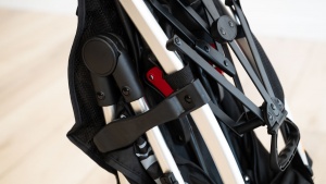 The latch to lock the Summer Infant fold needed to be coaxed into...