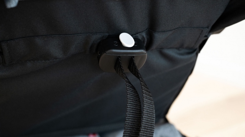 the zoe seat recline has a fairly standard plastic toggle that...