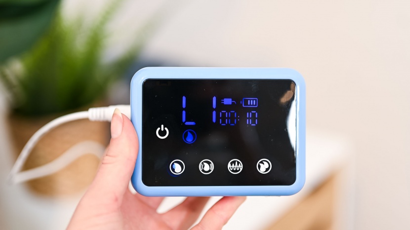 bellababy double electric breast pump - the bellababy breast pump has touch-sensitive buttons.