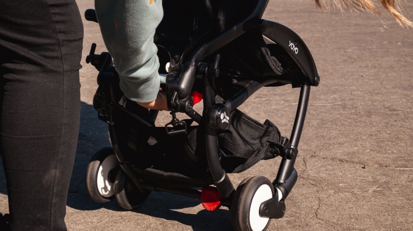 the main fold handle on the babyzen is under the seat and hard to...