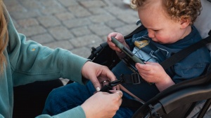 Adjusting the harness on the Kolcraft is easy enough but the...