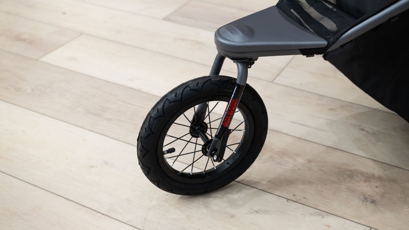 the joovy has a locking, swivel front wheel.