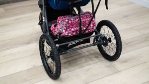 Cross bars and straps make using the storage bin as easy as it could...
