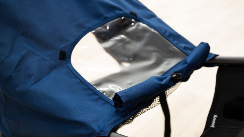 the zoom canopy has a vinyl peek-a-boo window that stays closed with...