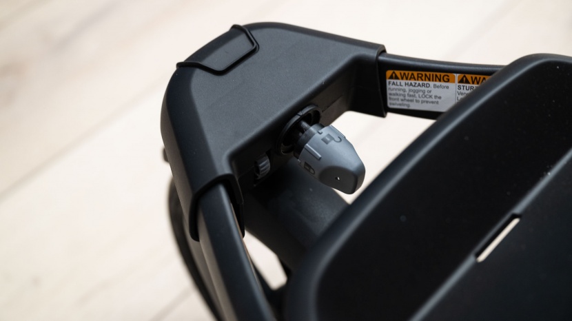 thule urban glide 3 - the main grey dial on the urban glide 3 locks the swivel wheel in...