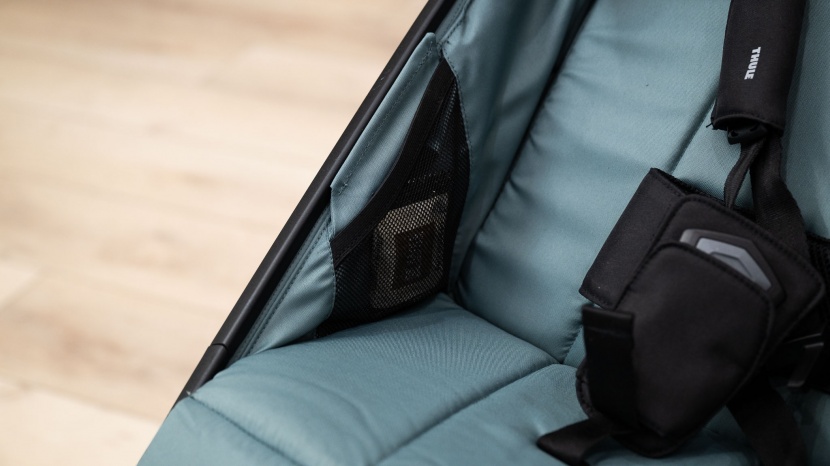 thule urban glide 3 - the urban glide 3 has interior seat storage pockets that can hold...