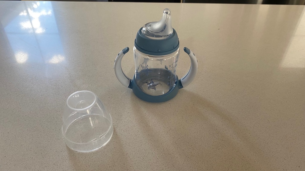 sippy cup - the nuk learner is a leak-proof option and comes with a lid, but it...