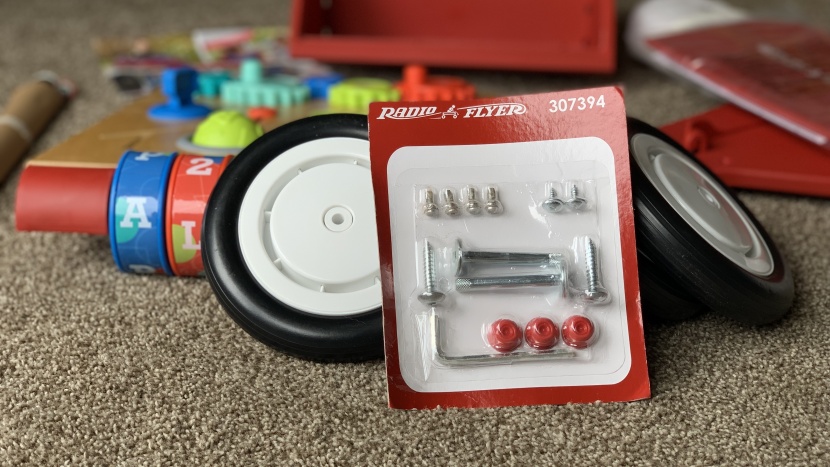 baby walker - the red caps are one-way parts, and if the push &amp;amp; play wheels...