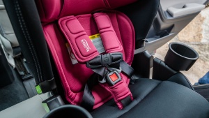 The Britax Poplar's harness has shoulder padding and a pad behind...