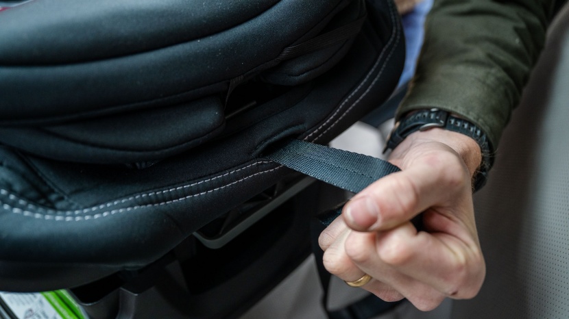 the poplar harness tightening strap is so low on the seat it can be...