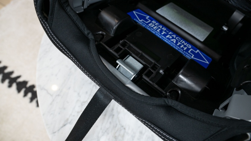 britax poplar s - the harness release strap on the poplar is under the seat and curves...