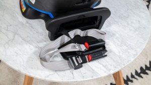 The Turn2Me LATCH connectors and strap are attached to the back of...